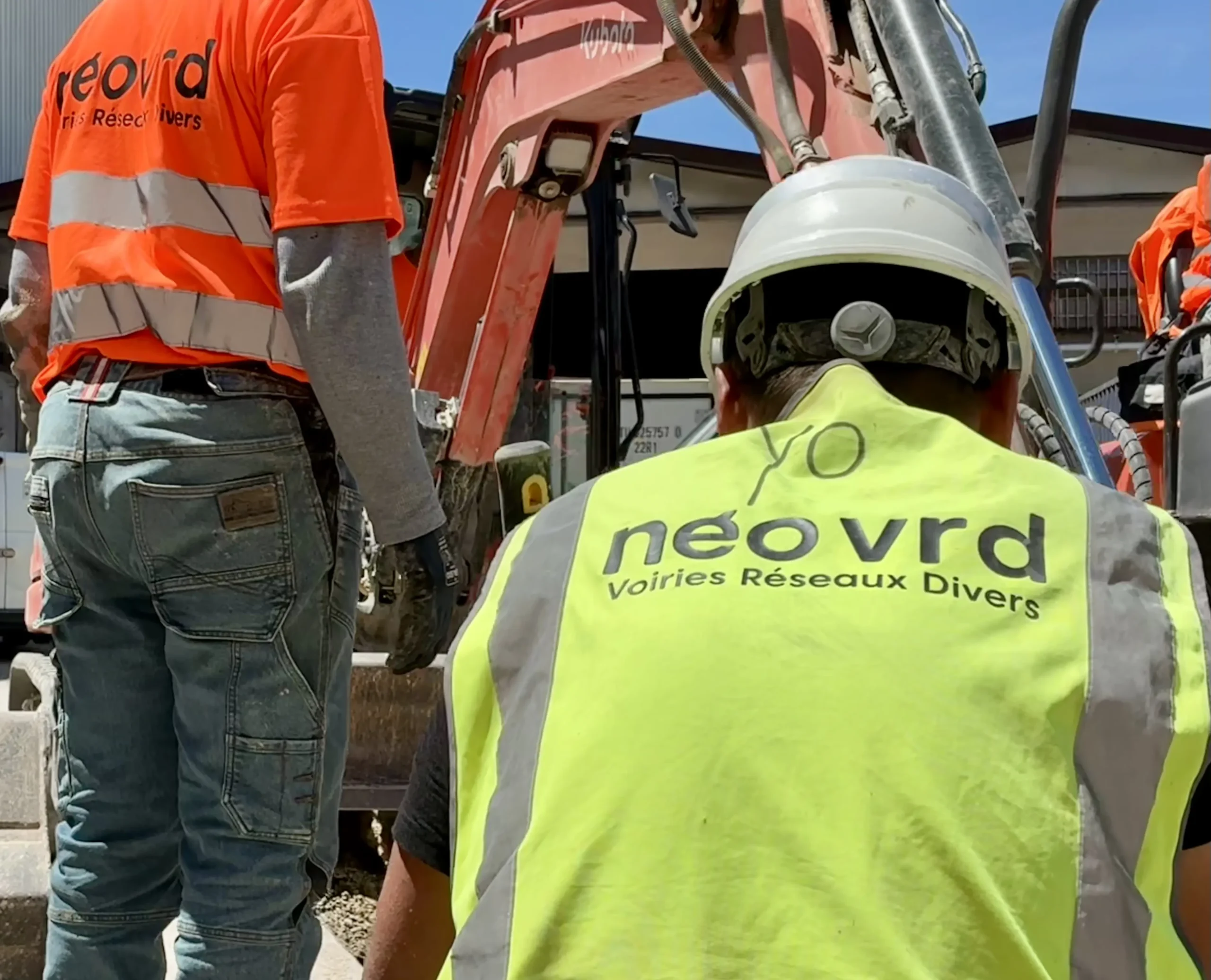 IMG_2060 group of men in orange suit standing near building during daytime